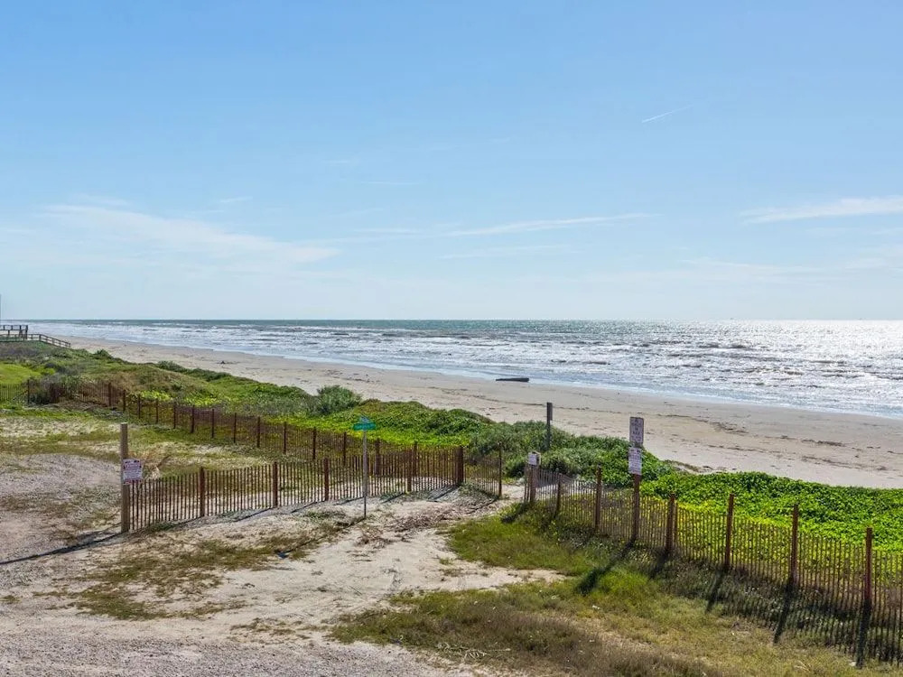 Beachfront Beauty in Galveston by RedAwning