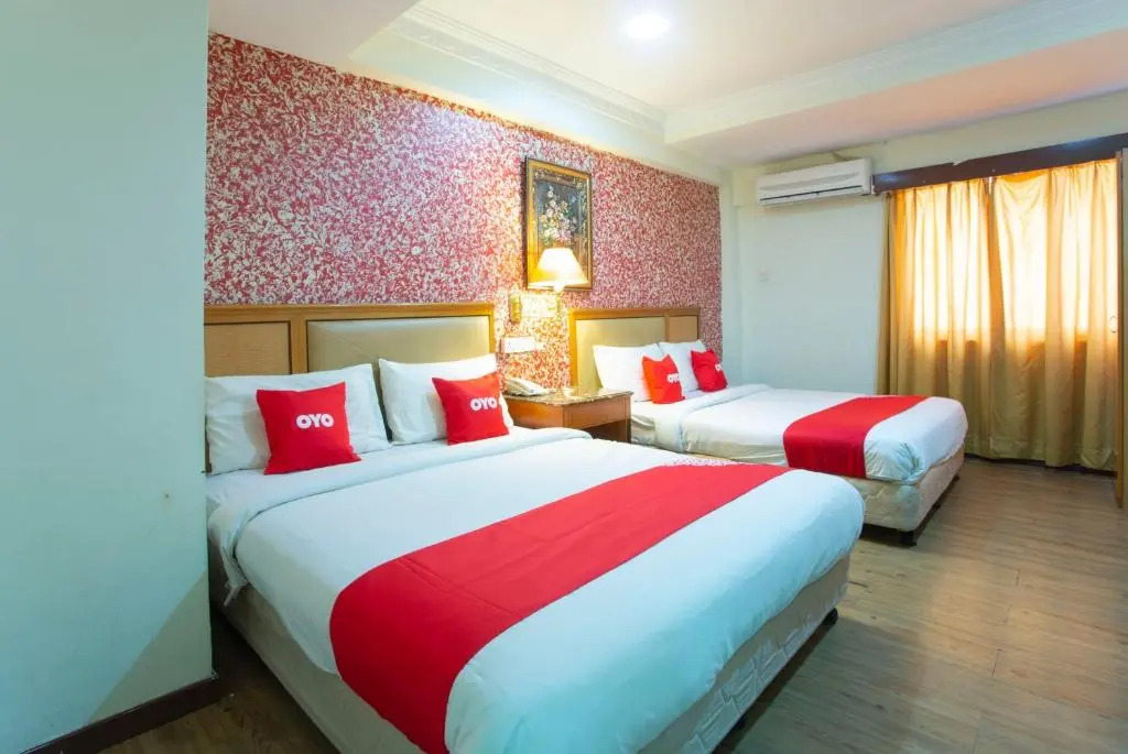 Capital O Hotel Grand Orchard