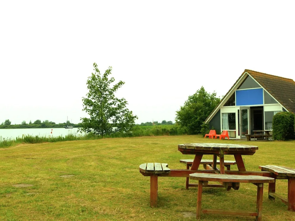 Cozy furnished house with a terrace, on a little beach
