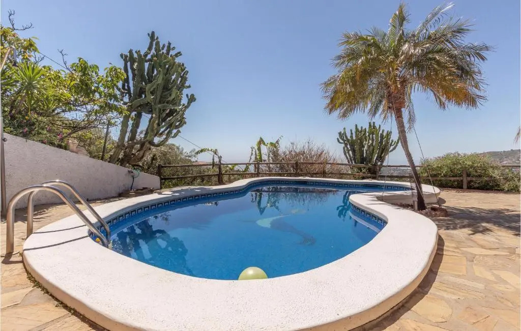 Amazing home in Torrox with 2 Bedrooms, WiFi and Outdoor swimming pool