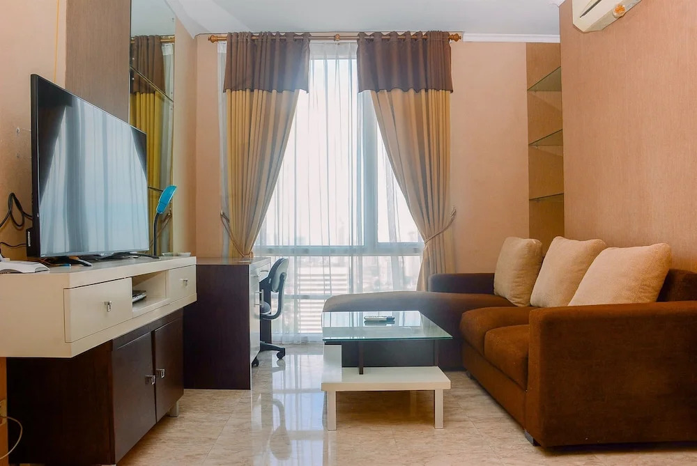 Modern 2 BR Apartment @ FX Residence with City View By Travelio