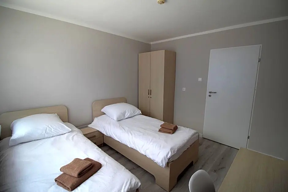 Pod Kominem Pokoje i Apartamenty