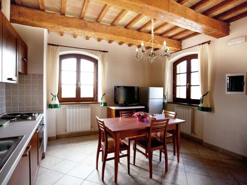 An agritourism complex with views of Assisi.