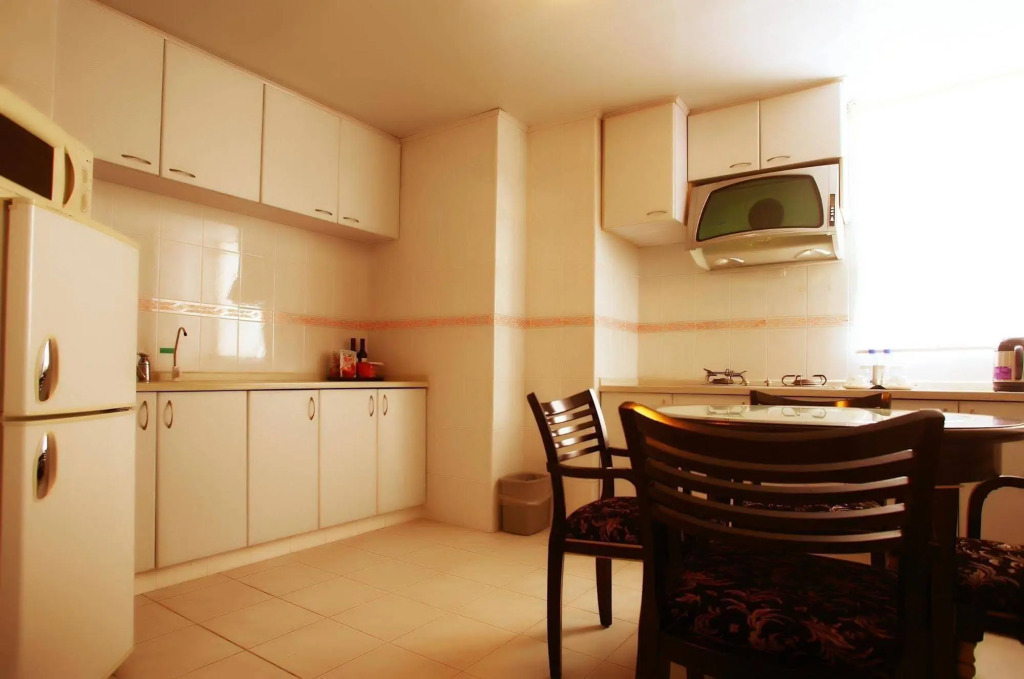 HuaJun Suite Hotel