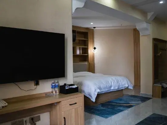 Grace Inn Qingju Hotel (Yanggu Wanhe City Branch)