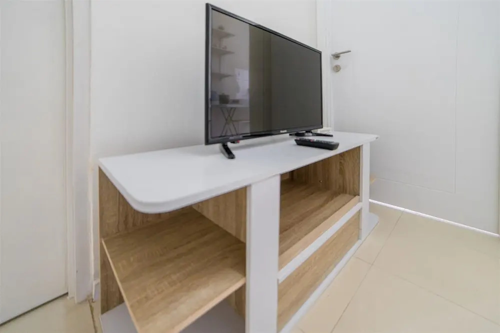 Minimalist Apartment with Sofa Bed at Parahyangan Residence