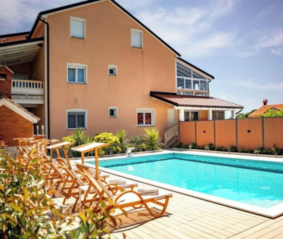 Apartments Foric Rab with Heated Pool, Sauna & Gym