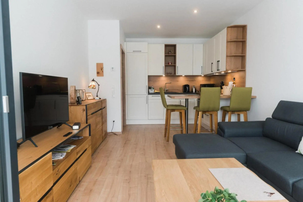 Ferienwohnung Bergsonne mit Sonnenbalkon und Tiefgaragen Parkplatz