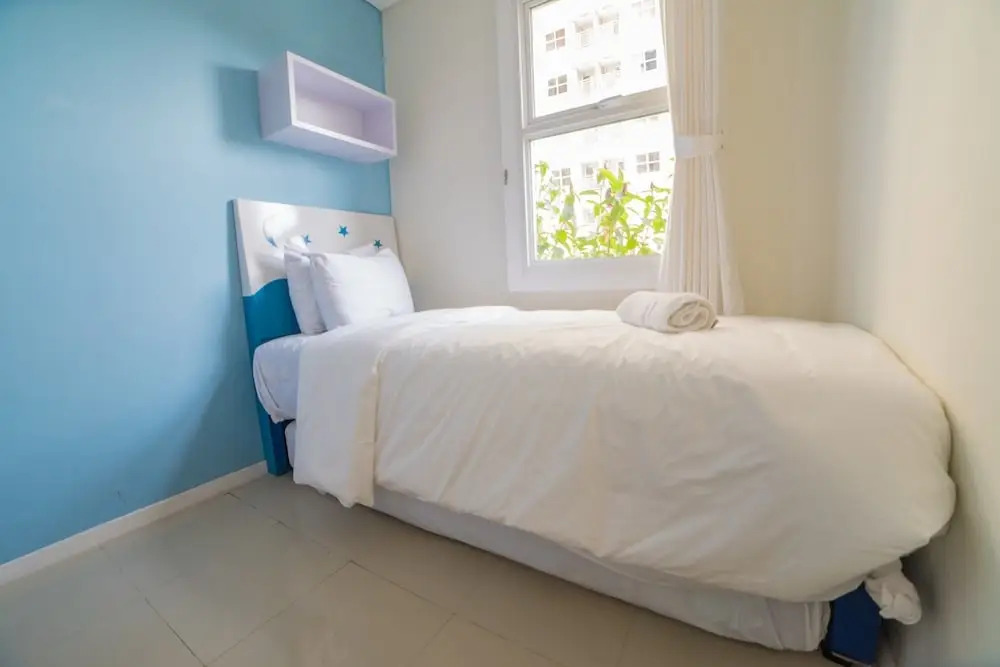 Cozy Apartment at Parahyangan Residence with Direct Access to Swimming Pool