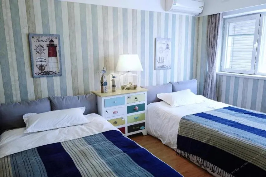 Xinjinshan Yijia Condo Hotel