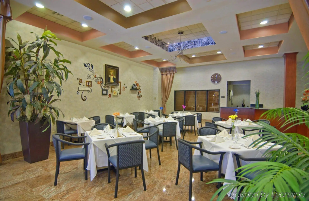 Marco LaGuardia Hotel & Suites