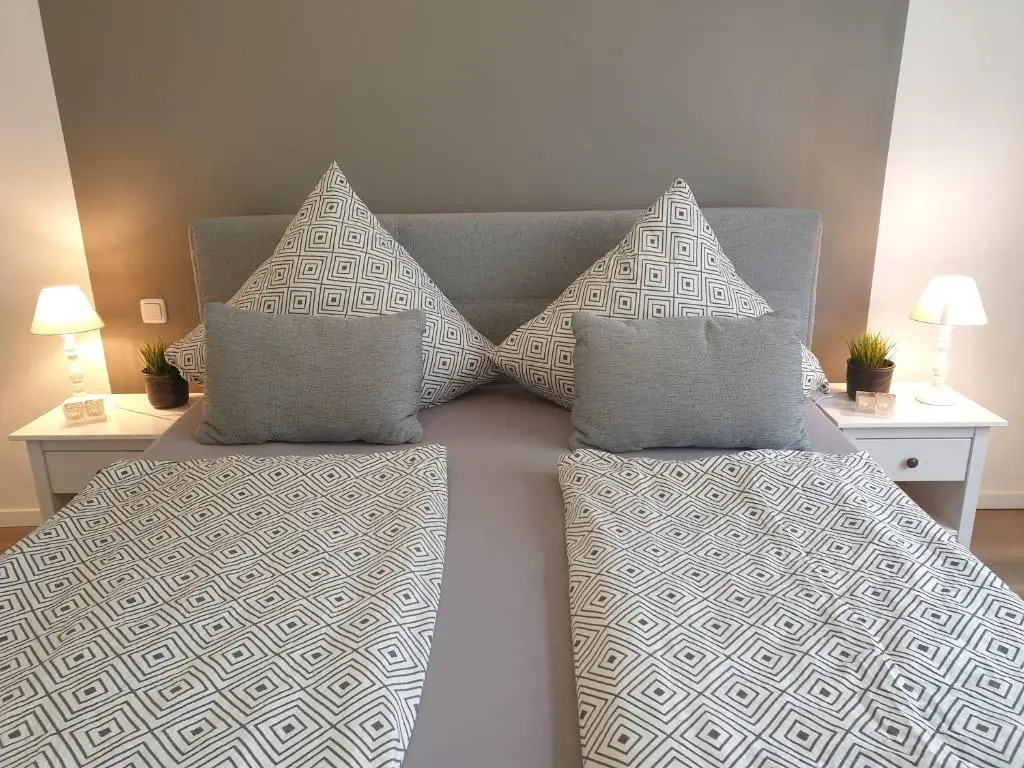 Ferienwohnung Ambiente II und III