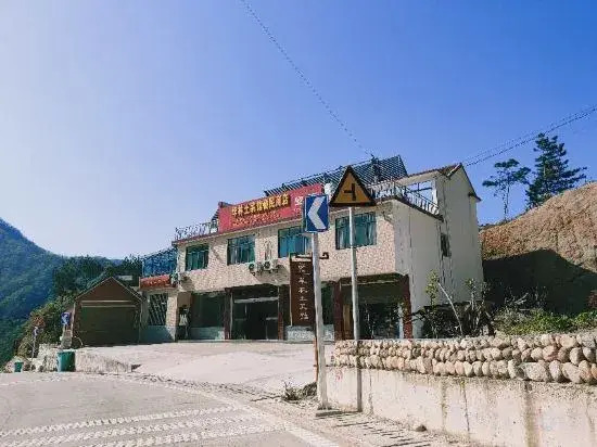 Yuexi Hualintu Restaurant Homestay