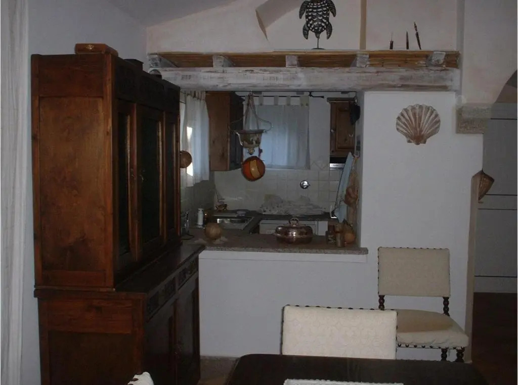 House with 3 bedrooms in Cannigione with wonderful sea view enclosed garden and WiFi 600 m from the beach