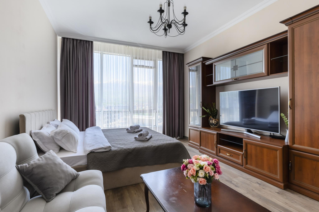 Almaty Apartments (Алматы Апартментс) на проспекте Аль-Фараби  9 блок 5Г