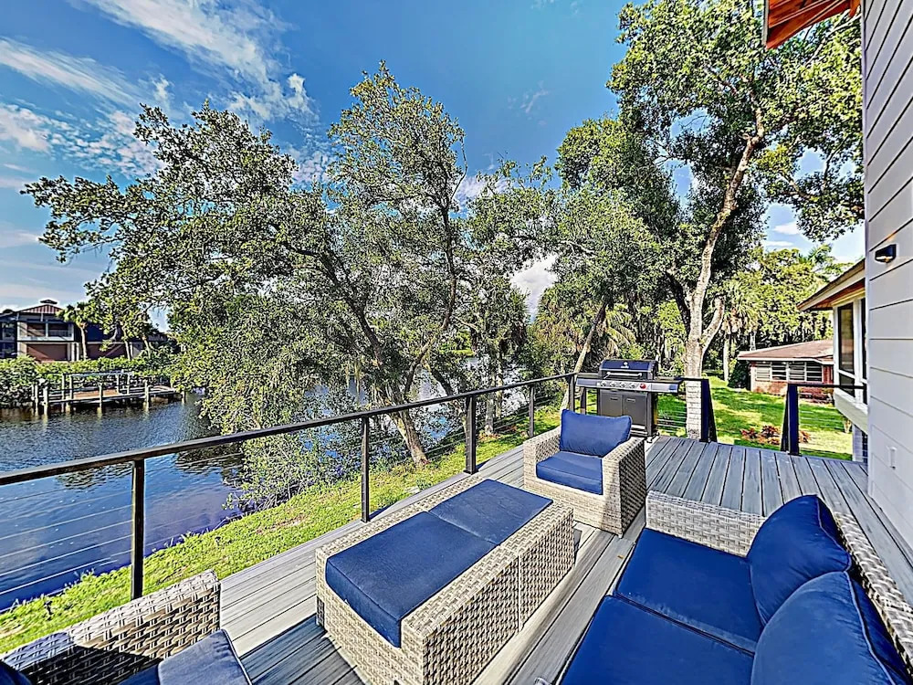 New Listing! Riverfront W/ Hot Tub & Dock 3 Bedroom Home