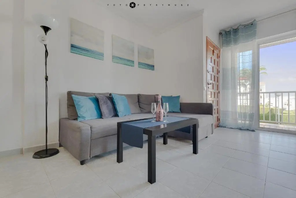 Apartment with pool, sea views & balcony less than 10min walk to La Mata Beach!