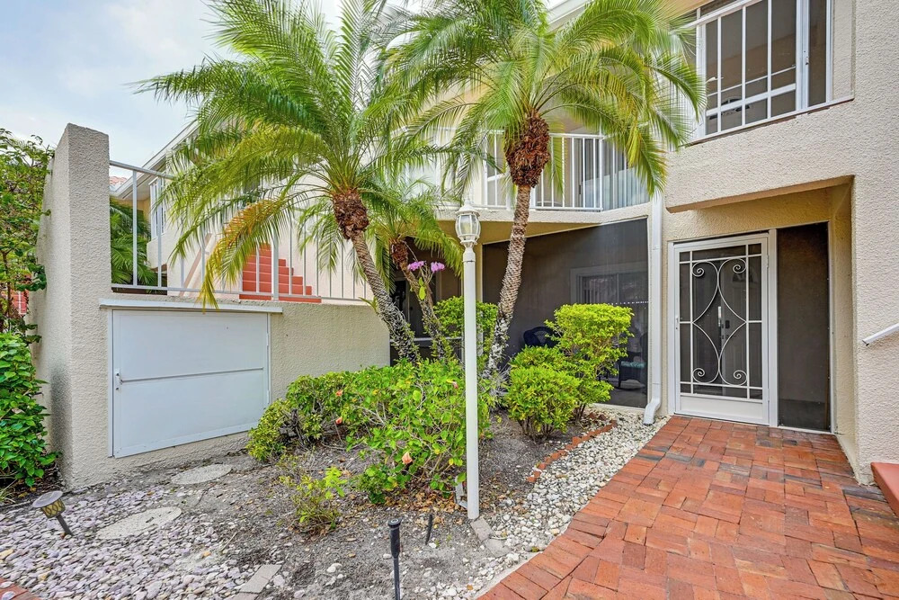 Lake Views & Resort-style Living! Naples Condo