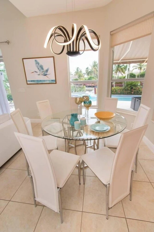Gorgeous 5 Bedroom Home w/heated Pool Canal Front