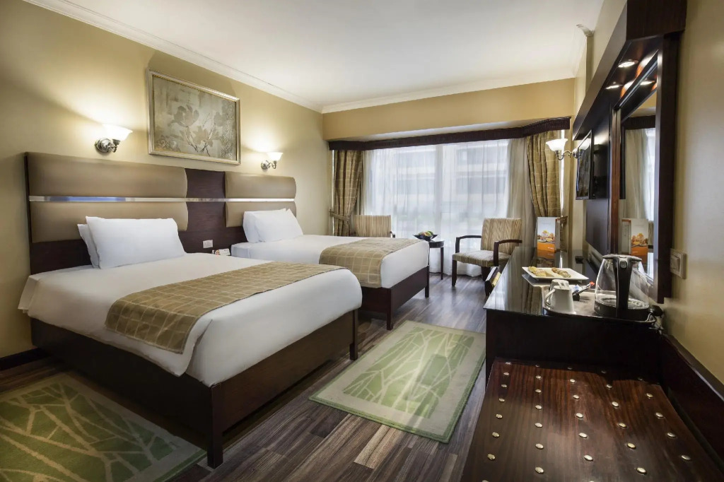 Отель Pyramisa Suites Hotel Cairo