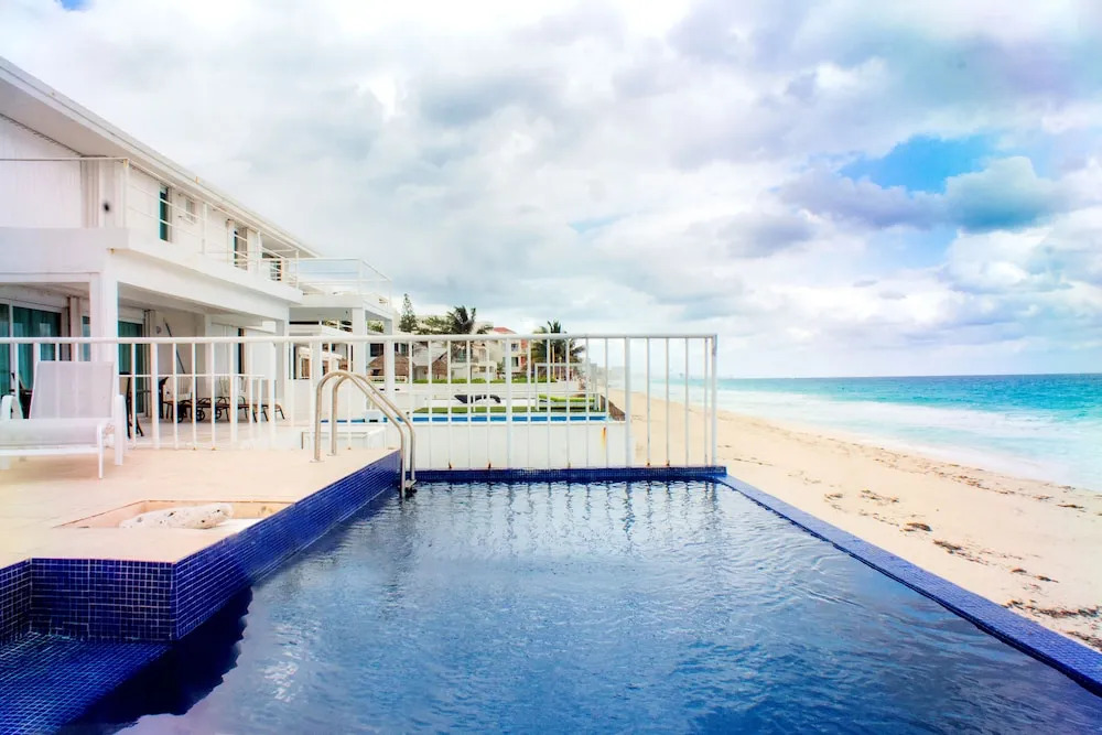 Private pool in beach front Villa