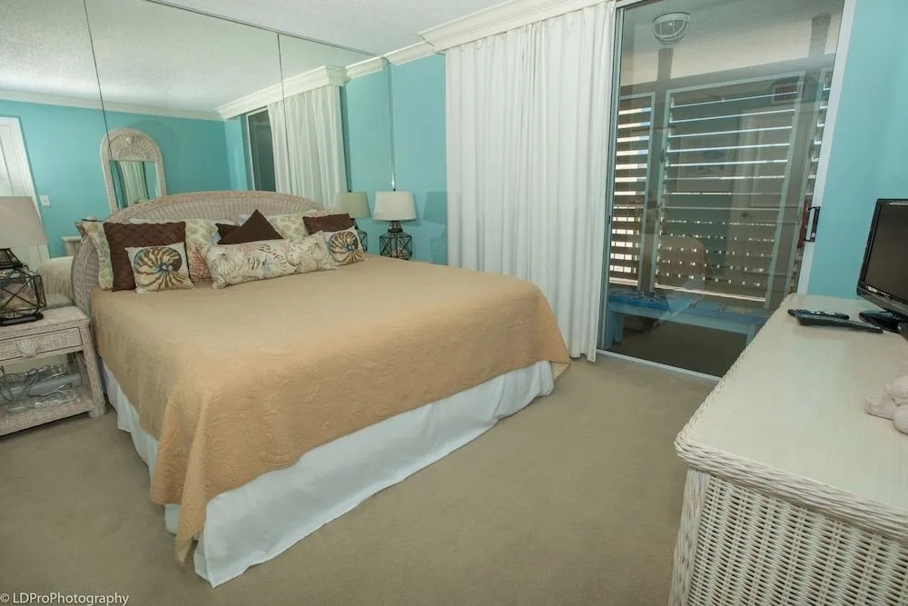 Magnolia House 309 1 Bedroom Condo by RedAwning