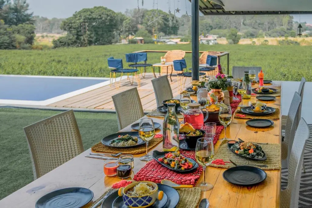 SaffronStays Onellaa, Nashik - infinity pool villa surrounded by a vineyard
