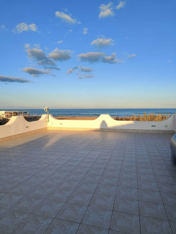 Mariella Rooms beach front with seaview and pool and garden