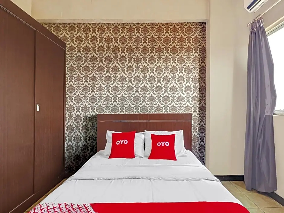OYO 90465 Ars Ira Property The Suites Metro