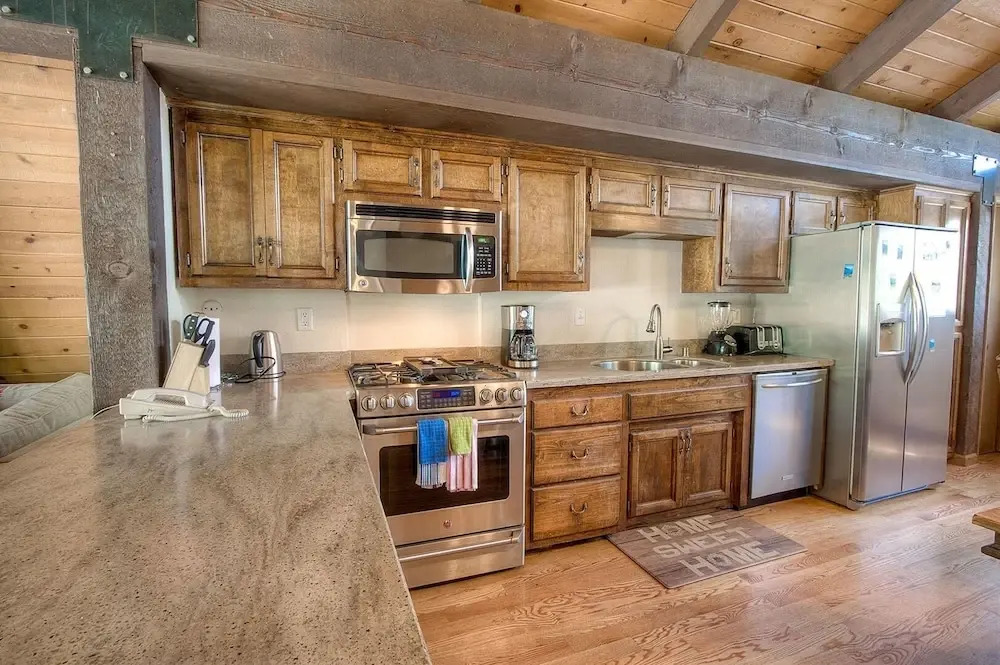 Remodeled Gambrel Style Home with Trees Views by RedAwning