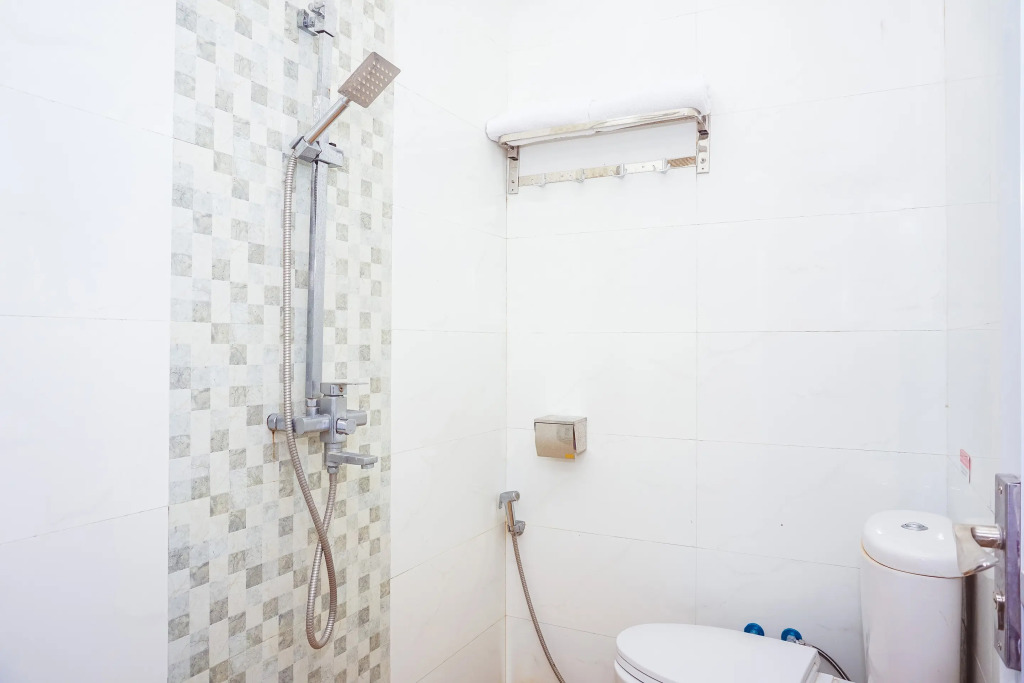 Hotel O Jalan Jenderal Sudirman Near Imam Bonjol Square Formerly Nelvi Guest House