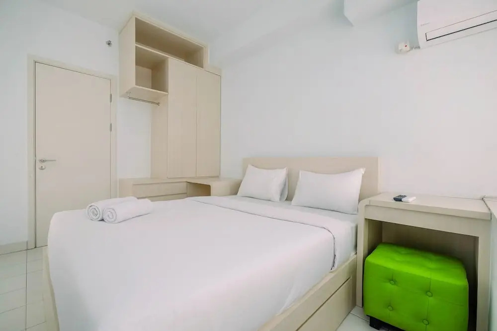Minimalist and Cozy 1BR Patraland Urbano Apartment By Travelio