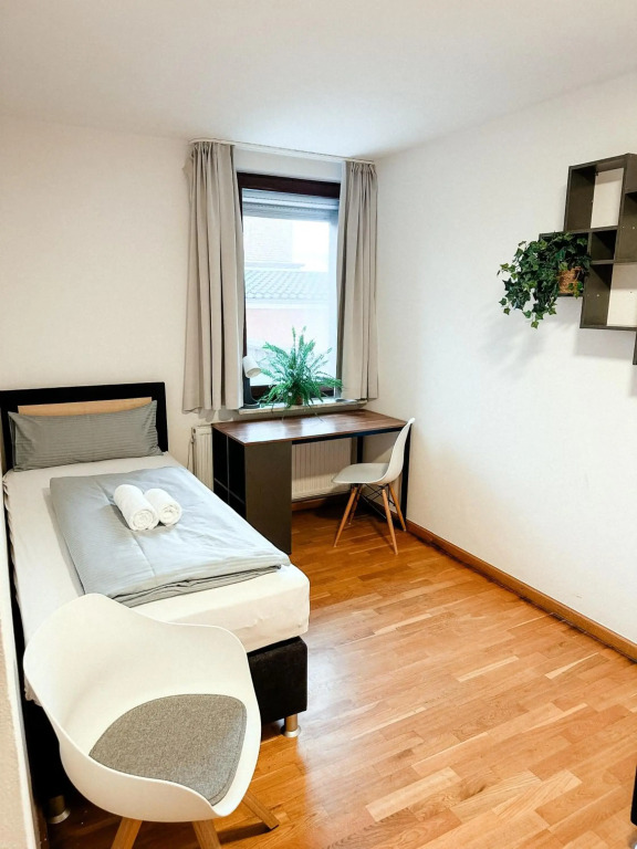Suiteable Living - Boardinghaus mit Parkplätzen, WLAN und Waschraum