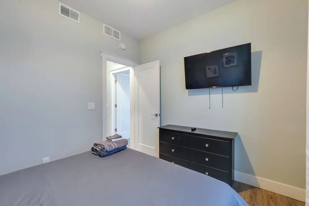 Walk to Front St! Traverse City Condo Near Skiing