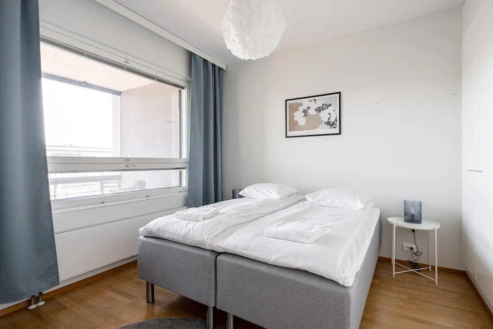 Top Floor 1BR Home with Parking, Sauna and Balcony