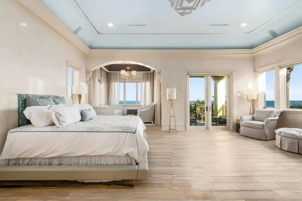 Luxurious 3-story Estate With Gym Pool Slide Private Beach and Lighthouse Views