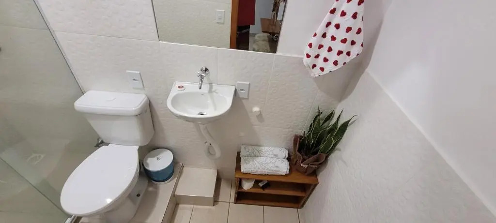 Suite climatizada, ao lado da praca principal