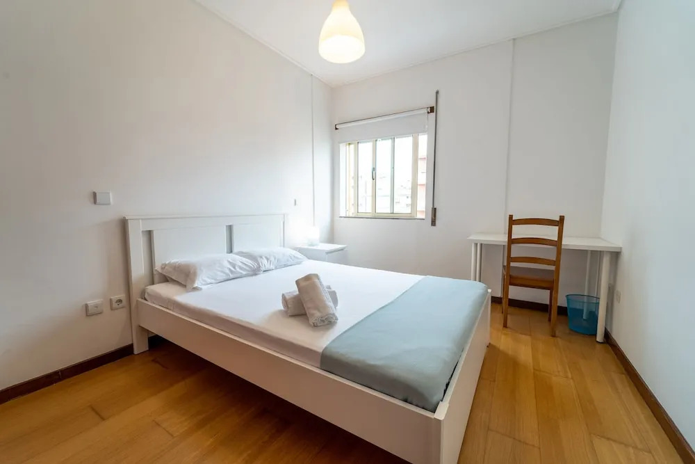 House and People - Martins Sarmento