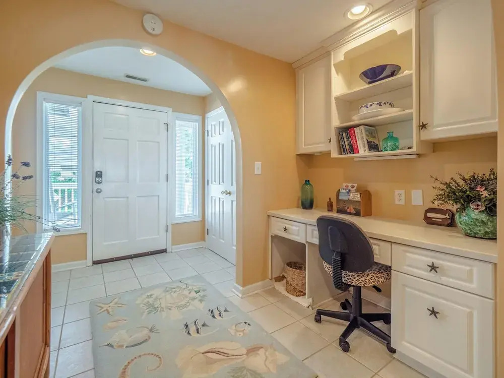 A Charm of Finches by Topsail Realty