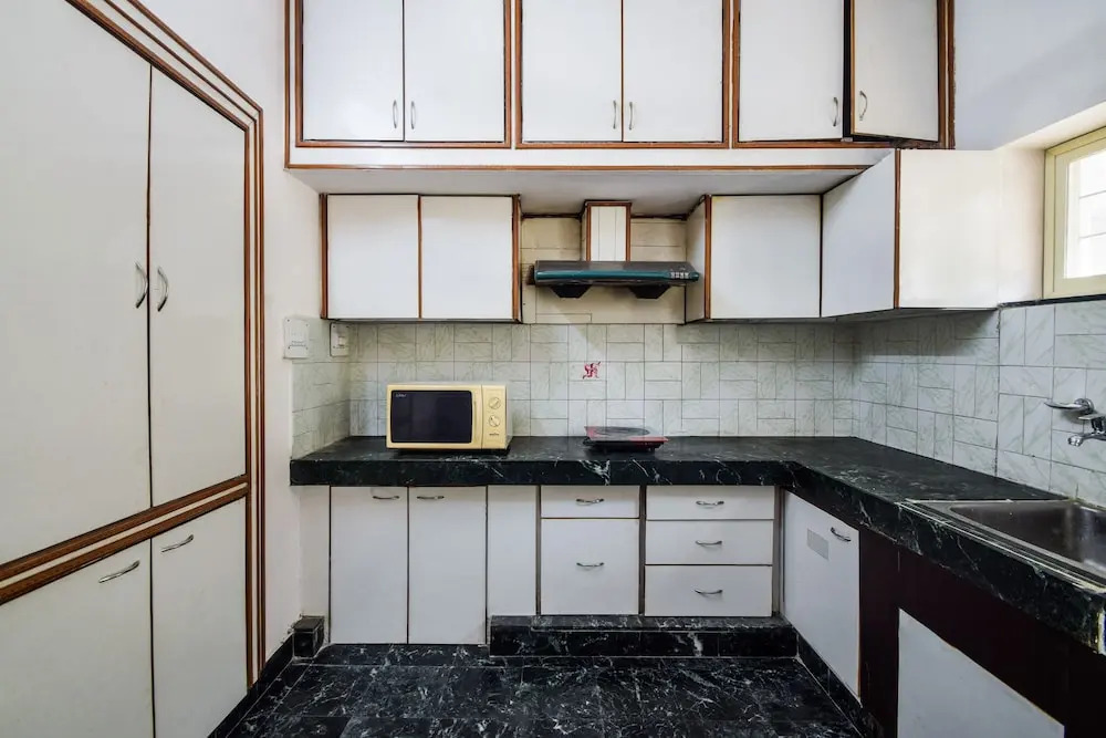 OYO Home 11874 Cozy 3BHK Goverdhan Villas