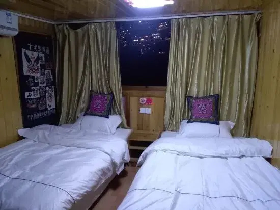 Xijiang Qianhu Miaozhai Maicheng Inn