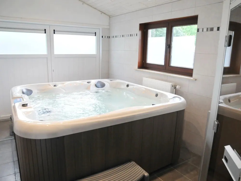 Holiday Home with Hot Tub & Steam Room in Forest