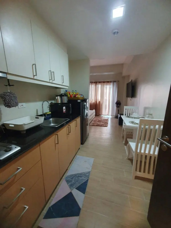 Cozy Iloilo City Condo With Shared Pool and Fitness Center