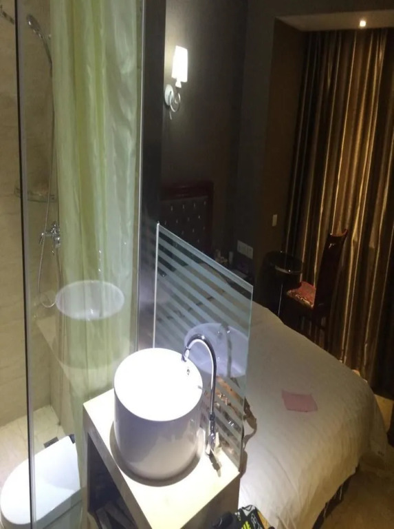Xinyijia City Hotel