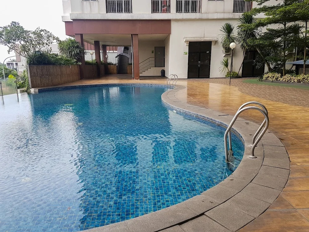 Modern and Relax Studio Room at Serpong Greenview Apartment By Travelio