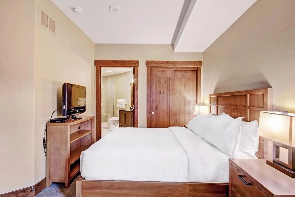 Luxury  At Base Of Peak 8, Steps From Winter Activities 2 Bedroom Condo by RedAwning