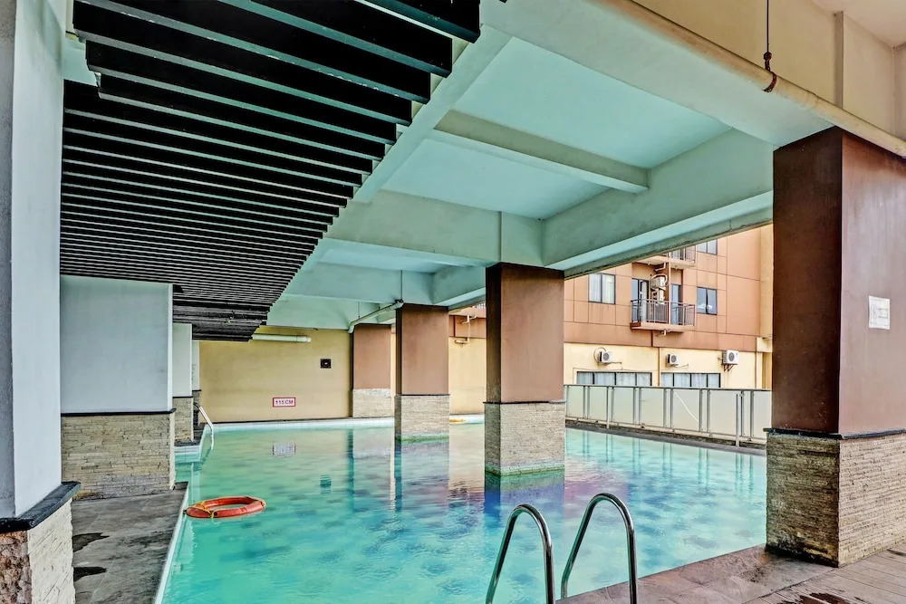 OYO Life 92735 Apartemen Tamansari Panoramic By Santuy