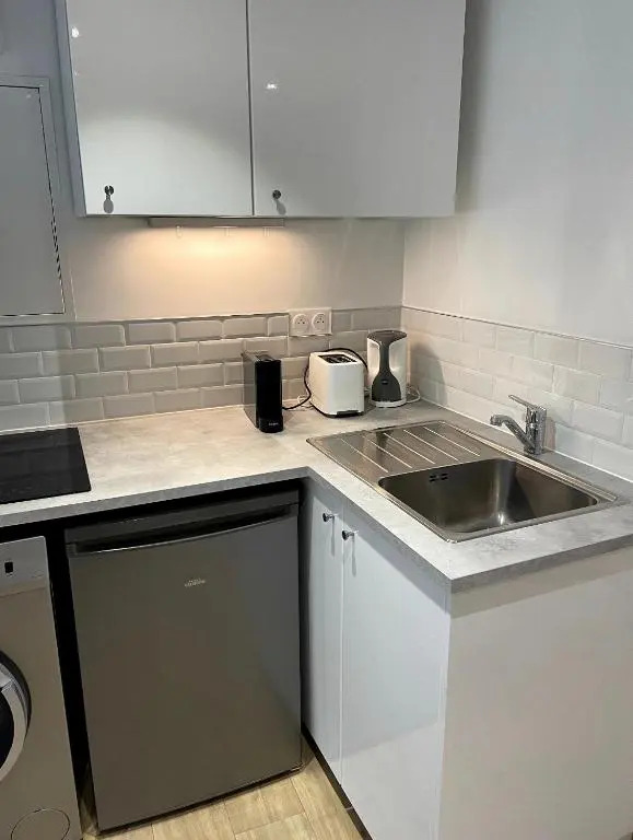 Superbe appartement avec accès patio