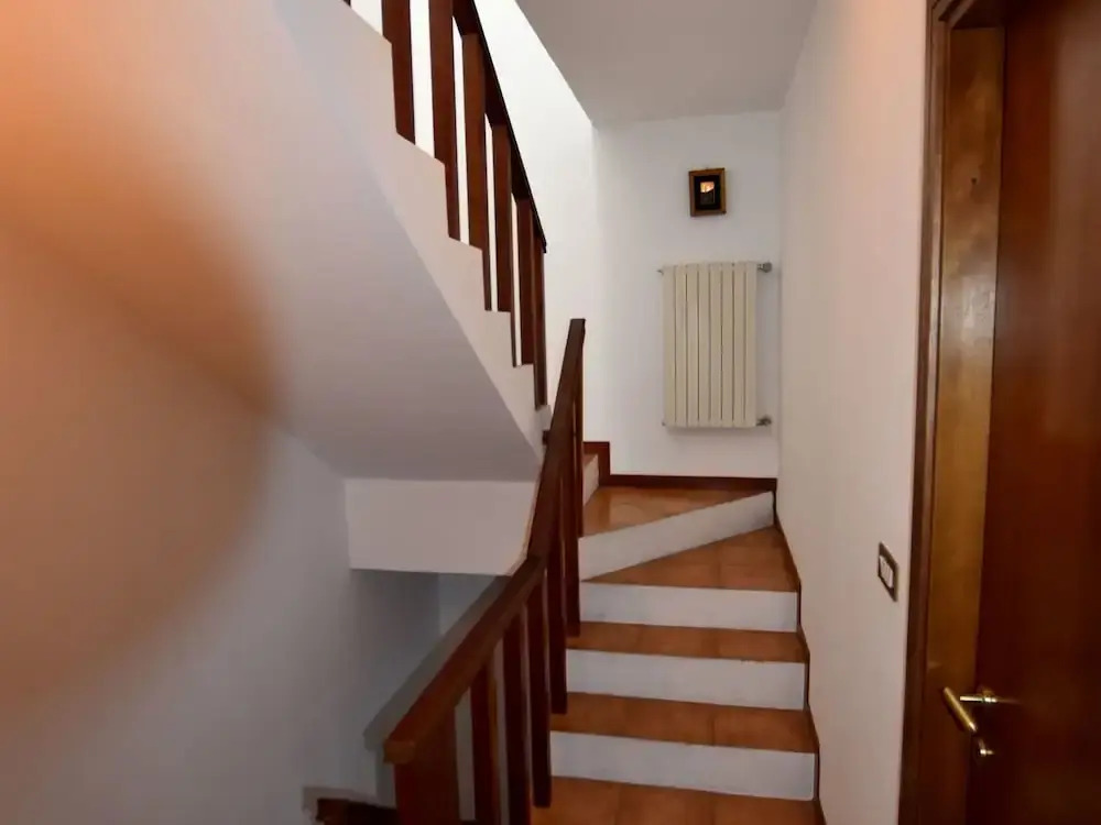 Two-family home with private garden 100 metres from the lake and beach