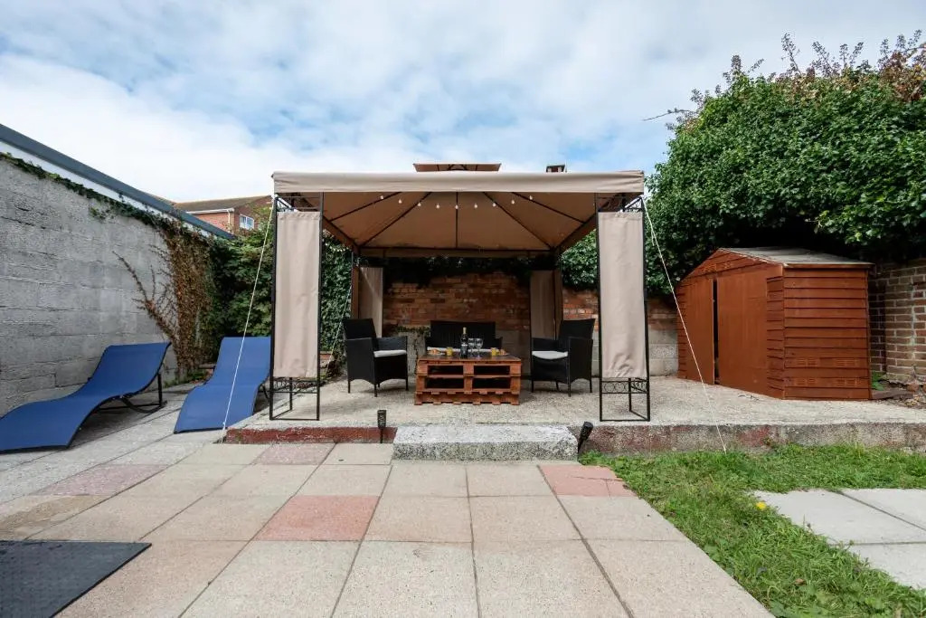 1-Bedroom Apartment with a Private Garden, beach 5-min walk